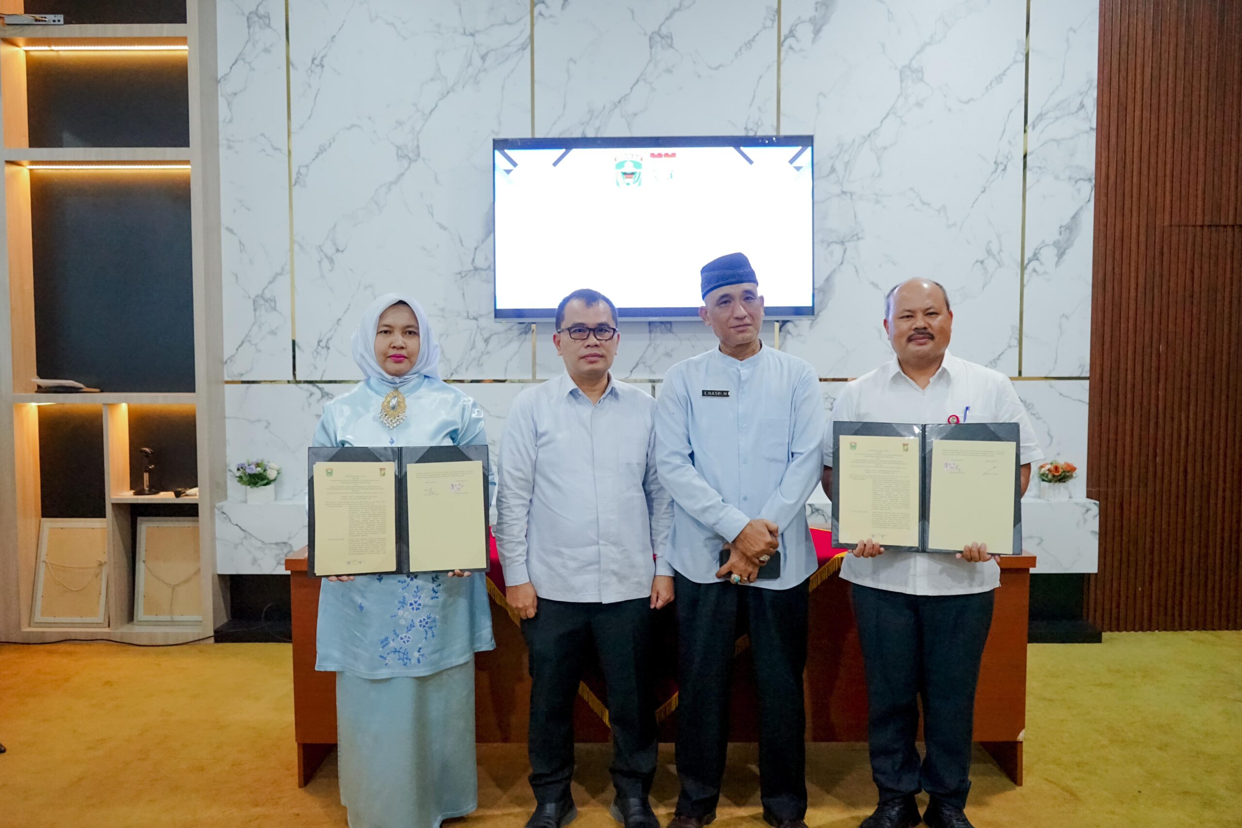 DKUKMPP Kabupaten Solok dan DKUKMPP Kabupaten KamparTandatangan Perjanjian Kerja Sama