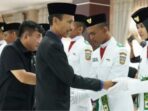 Wabup H. Yulian Efi Kukuhkan 67 Paskibraka Solok Selatan 2024